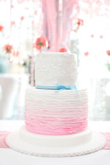 Pastels colored layered birthday cake 