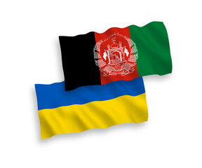 National vector fabric wave flags of Islamic Republic of Afghanistan and Ukraine isolated on white background. 1 to 2 proportion.