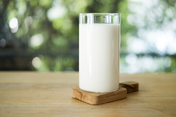 Glass of fresh milk in tall glass