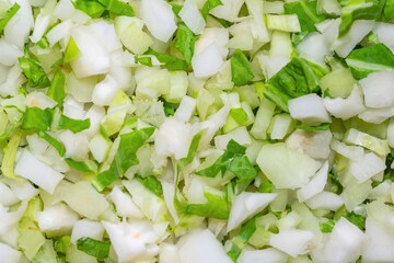 chopped cabbage into small cubes. background or texture