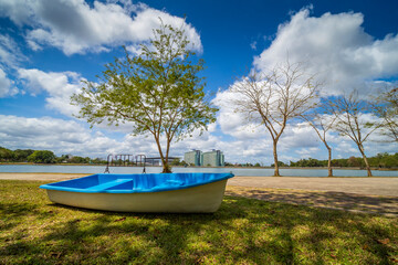 Boats moored on land and blue sky. 