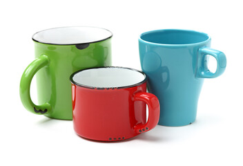 Colorful cups on white background 