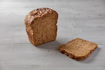 Loaf of bread. Grey background, copy space.