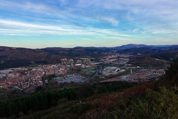 Fototapeta premium view of the city of bilbao from a mount at sunset