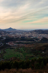 Fototapeta na wymiar view of the city of bilbao from a mount at sunset