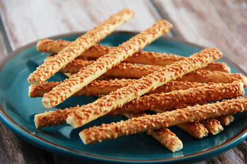 dry crackers sticks in sesame sprinkles