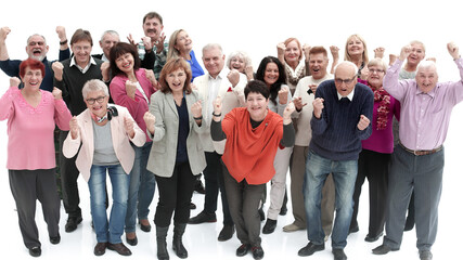 Fototapeta na wymiar Group of senior people raising their hands celebrating a victory