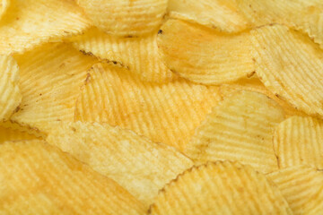 Potato chips background. Food background. 