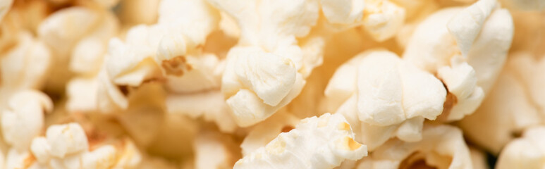 close up view of airy crispy popcorn, banner, cinema concept