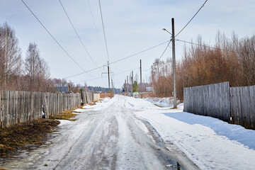Traditional Russian village with an old house in spring