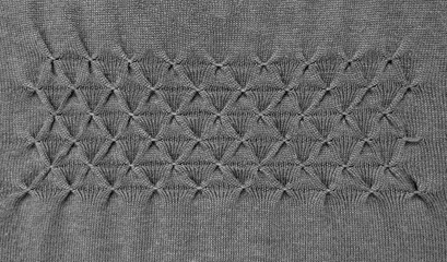 gray Smocking embroidery woven fabric background, Detailed Knitted sweater texture