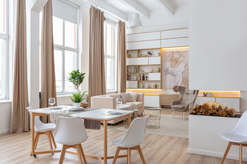 interior design spacious bright studio apartment in Scandinavian style and warm pastel white and...