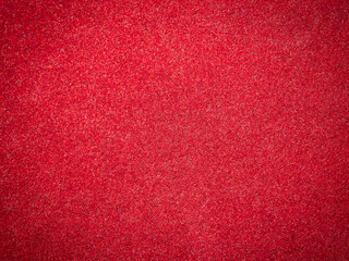 Bright red velour paper texture. Velvet surface, close up