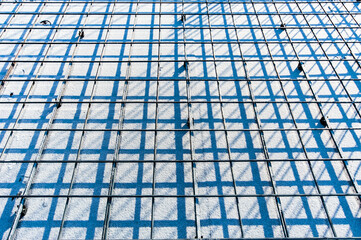 metal reinforced mesh on construction site in winter