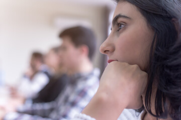Group of muttiethnic IT students working at their computer lab.  Group of student listening lesson from their professor. Education and technology concept.