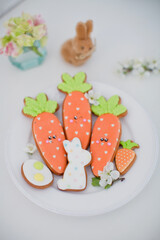 Easter glazed cookies on white plate