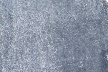 Background from old wall, texture damaged concrete surface, gray plaster, horizontal close-up photo.