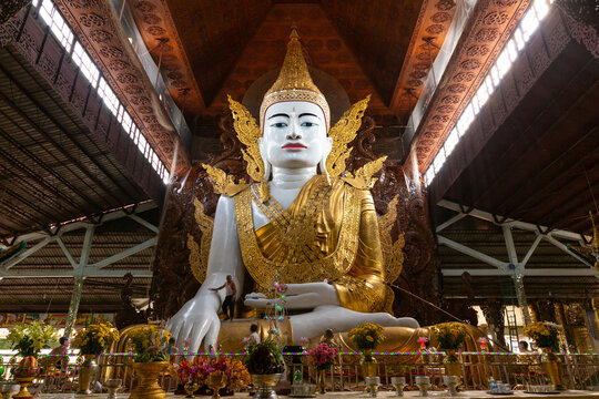 Buddha in gold, royal clothes,Yangon, Myanmar,gold Buddha statue (Ngar Htat Gyi Pagoda)