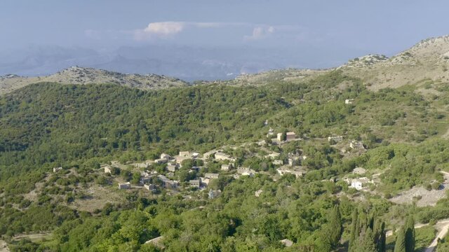 Old Perithia abandoned village in Corfu, Greece. Ghost village, drone footage, aerial, landscape, mountains, panorama. Drone Video Footage 4K #1