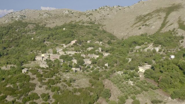 Old Perithia abandoned village in Corfu, Greece. Ghost village, drone footage, aerial, landscape, mountains, panorama. Drone Video Footage 4K #5