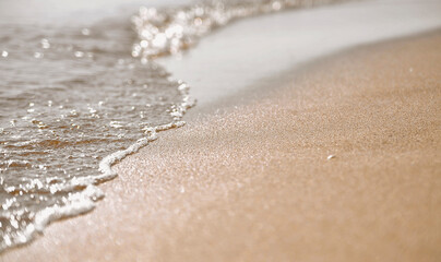 sand and waves on the beach