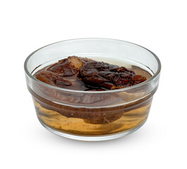 dry shiitake mushroom in transparent bowl with water isolated on white background  ,include clipping path