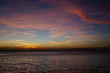 Naklejka na ściany i meble Manila Bay sunset with pink skies