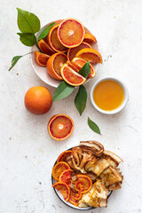 Traditional french crepes suzette with red bloody oranges