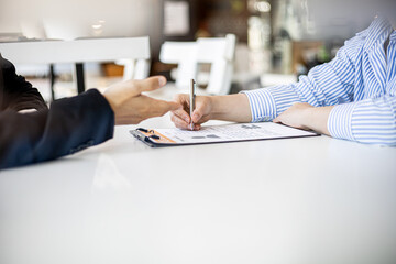 Job interviewees reviewing their resume.