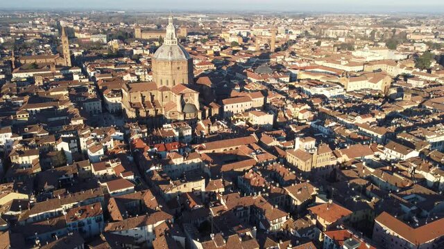 Drone view of the medieval city of Pavia in Italy : flyng over Ticino river and Old Town