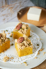 Pumpkin Cube pound cake set on cafe table.