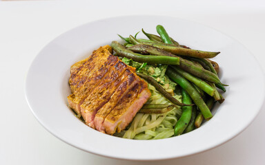 Steak with green beans and noodles