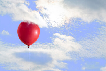 Obraz na płótnie Canvas creative idea of the balloon and the gift present box fly in the air