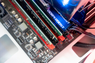 inserting plug in the ram ddr memory card in the computer mainboard, random access memory
