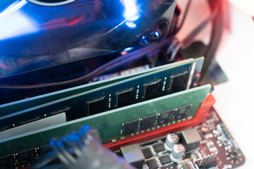 inserting plug in the ram ddr memory card in the computer mainboard, random access memory