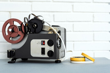 Tape recorder near brick wall