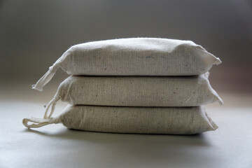 Three sandbags stacked together for use in lab or science experiments. Scientific and physics...