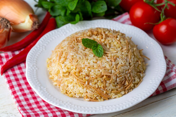 Traditional delicious Turkish food; Bulgur pilaf with vermicelli (Turkish name; sehriyeli bulgur pilaf)