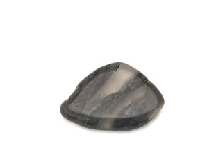 macro shooting of natural stone - black quartz mineral gem stone interspersed with organic matter...