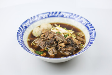 Thai boat noodles is Thailand's most famous noodles soup,Thai Boat noodles soup or Guay tiew reua ,Rice noodles thicken soup with stewed pork and pork ball, Braised pork and liver pork, 