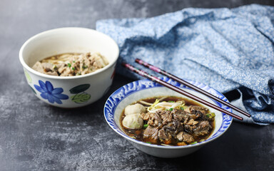 Thai boat noodles is Thailand's most famous noodles soup,Thai Boat noodles soup or Guay tiew reua ,Rice noodles thicken soup with stewed pork and pork ball, Braised pork and liver pork, 