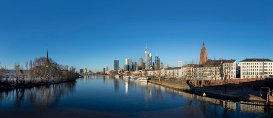 Fototapeta premium sunrise view to skyline of Frankfurt with river Main