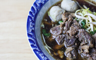 Thai boat noodles is Thailand's most famous noodles soup,Thai Boat noodles soup or Guay tiew reua ,Rice noodles thicken soup with stewed pork and pork ball, Braised pork and liver pork, 