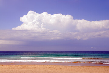 Storm clouds out at sea off the coast of Manly Beach in New South Wales, Australia