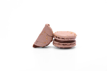two cake of macaron or macaroon brown chocolate color. Delicious macaroon isolated on white background. French sweet cookie.