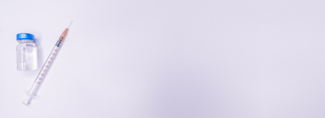 Vaccine vial dose flu shot drug needle syringe,medical concept vaccination hypodermic injection...