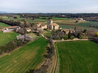Naklejka premium aerial view of fields and old village