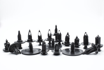 Set of various types of automotive staples on white background