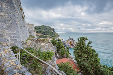 Beautiful views of Porto Venere: Doria Castle (12th century) walls with The church of Saint Peter...