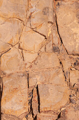 Abstract background from natural stones close-up. Stone background for high resolution wallpaper. High resolution brown natural stone surface.